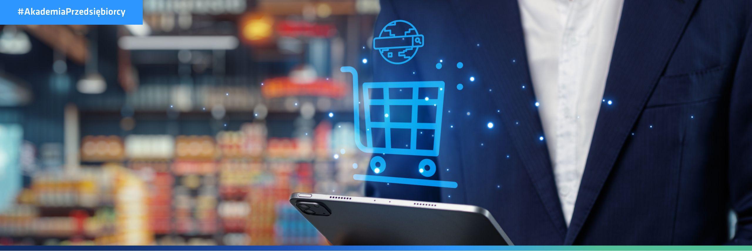 Regulamin sklepu internetowego: przedsiębiorca z tabletem w ręku